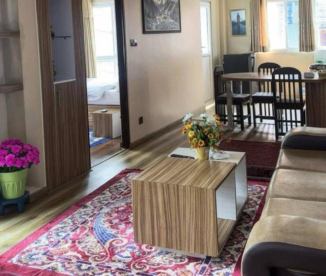 Living and dining area of an apartment at House of Forrest