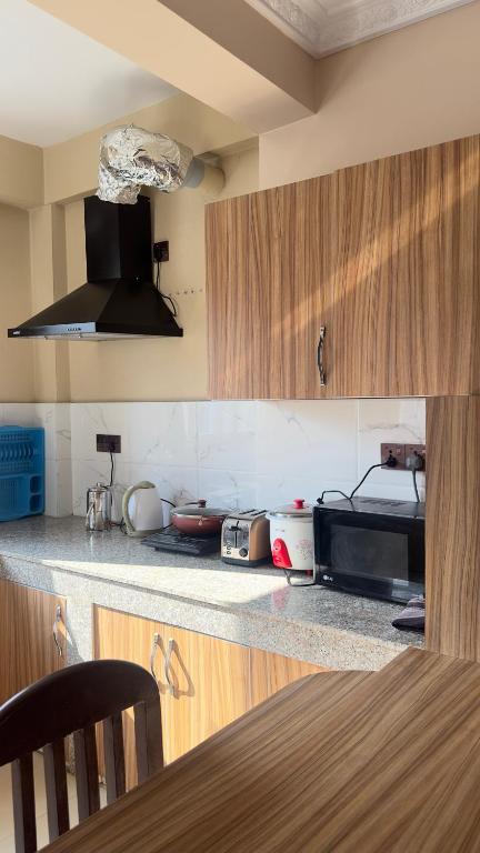 Fully equipped apartment kitchen at House of Forrest Kathmandu